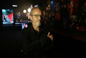 Xavier Mercadé, a l'exposició amb les seves fotos de concerts al Palau Robert | ACN
