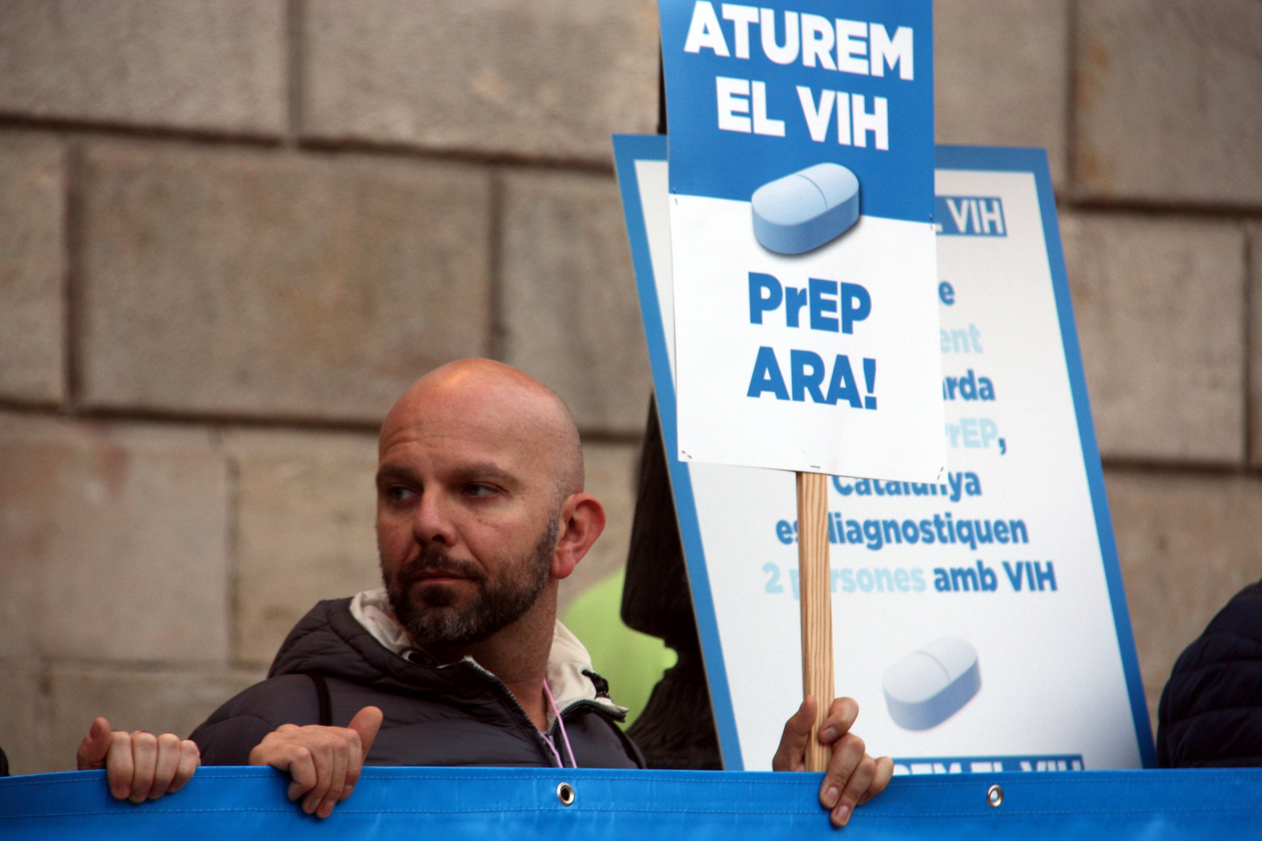 Un manifestant reclamant la PrEP | ACN
