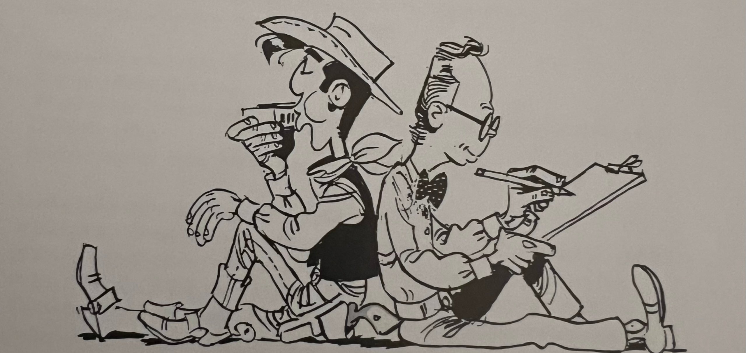 Lucky Luke i Morris, el seu creador, esquena per esquena
