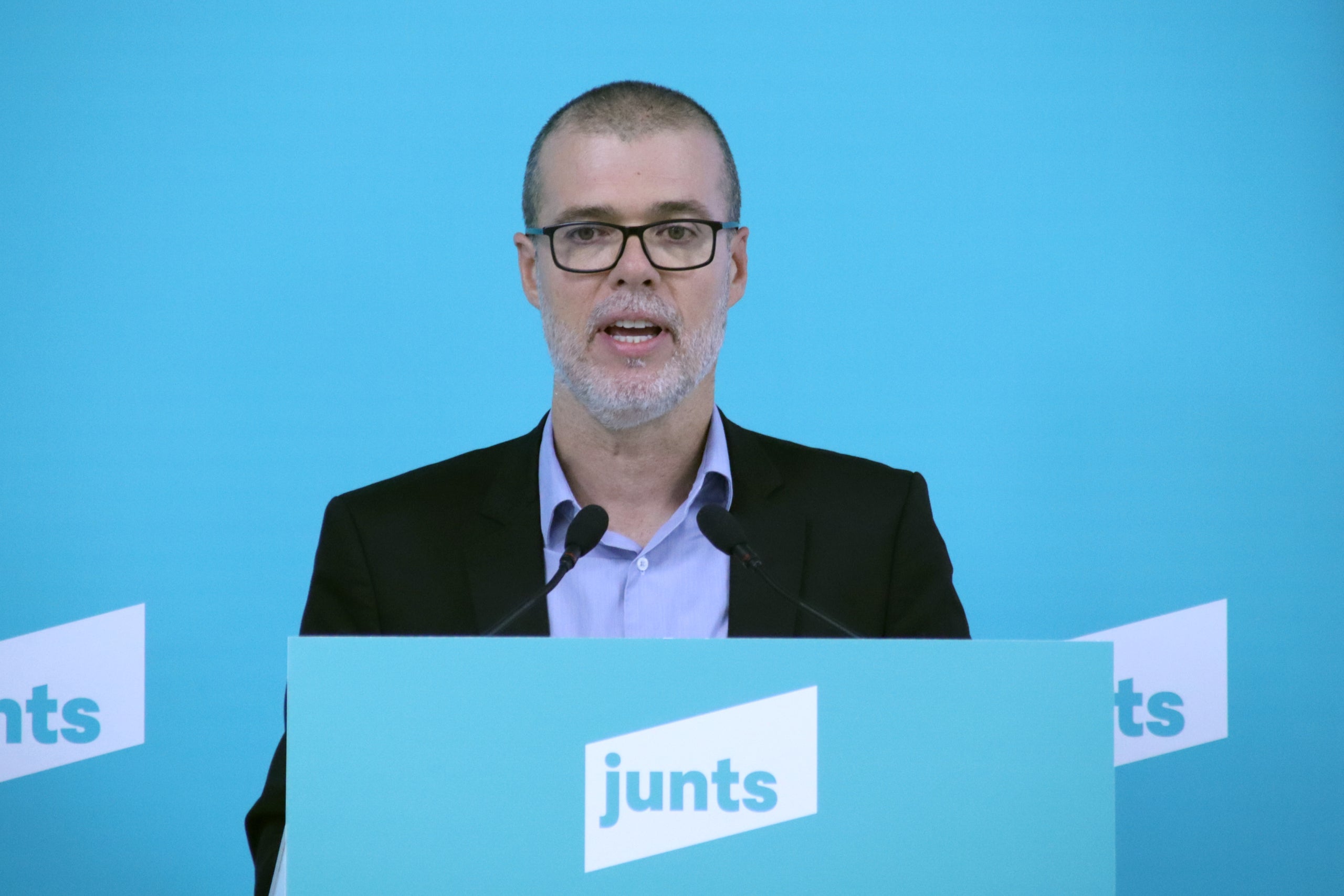 El director del Congrés Nacional de Junts, Josep Maria Cruset, durant una roda de premsa a la seu del partit / Mariona Puig / ACN
