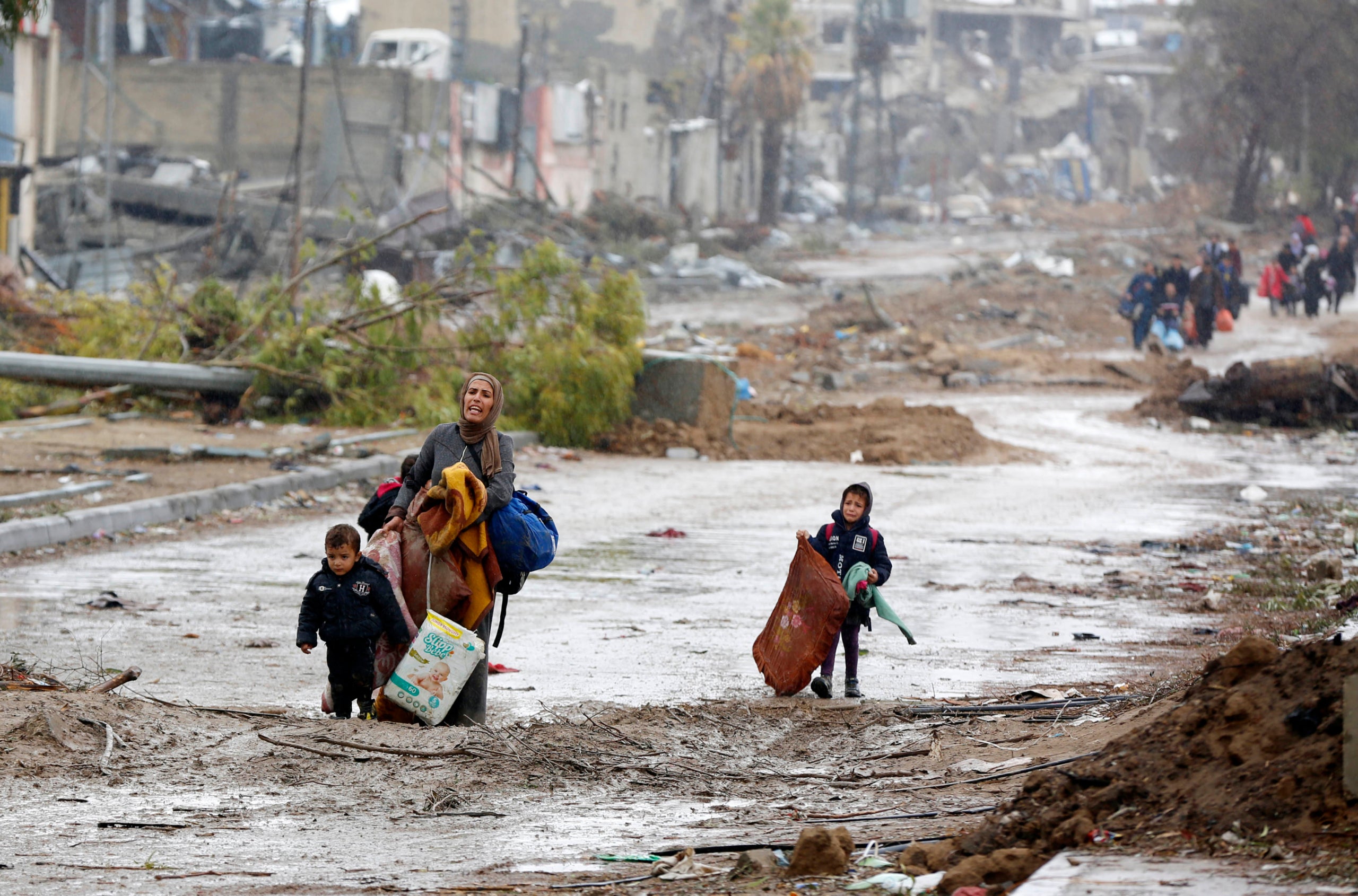 Famílies palestines que fugen del nord de la Franja de Gaza per anar al sud / UNRWA / Ashraf Amra