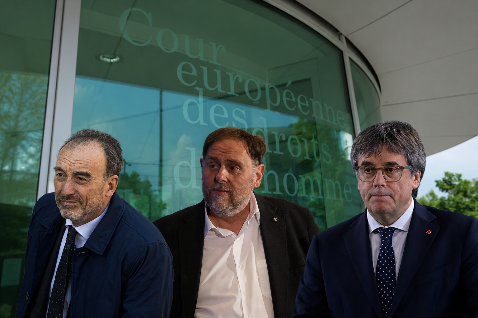 Puigdemont, Junqueras i Marchena en una imatge d'arxiu amb la seu del TEDH de fons/Arxiu Món